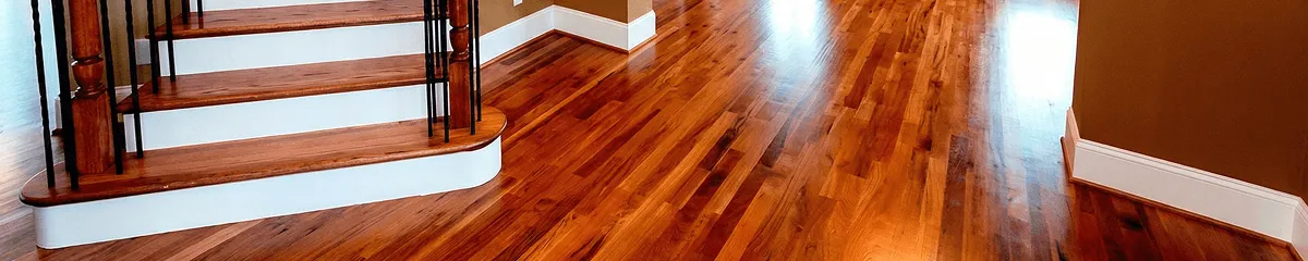 Base floor of a staircase with professionally restored wood flooring in Tempe AZ